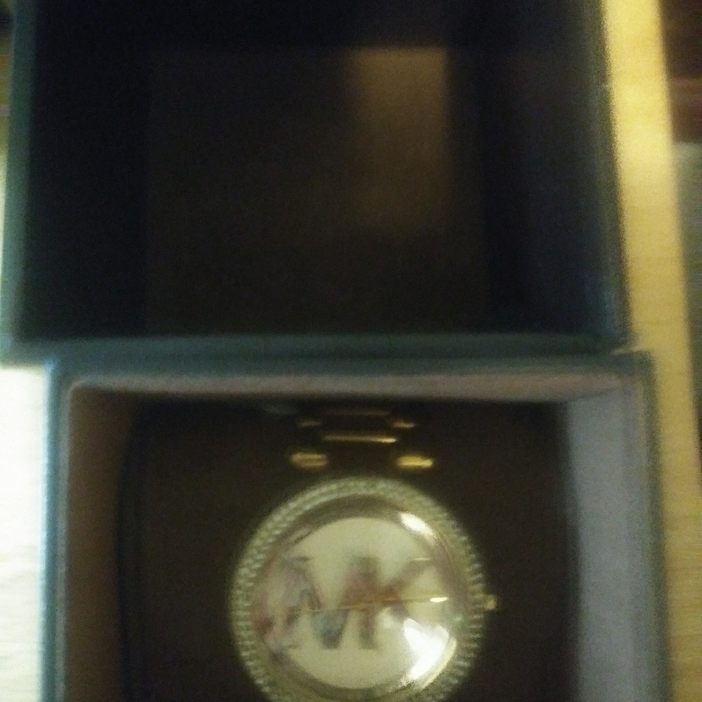 authentic MK gold watch from Dillards